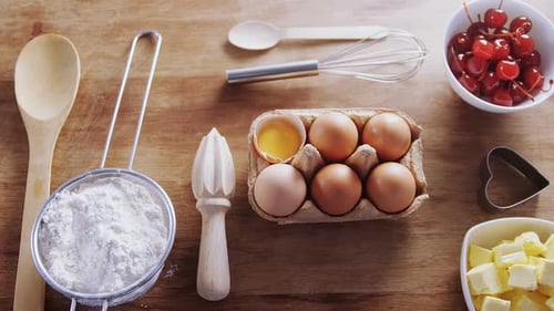 Overhead View of Baking Ingredients on Wooden Table