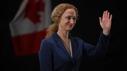 Woman Waving Hand With Canadian Flag Backdrop