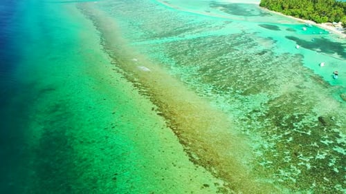 Tropical drone tourism shot of a summer white paradise sand beach and blue water background