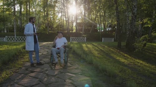 Doctor Chat with Old Patient in the Park