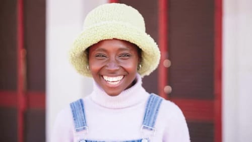 Smiling Young Adult Posing in Overalls