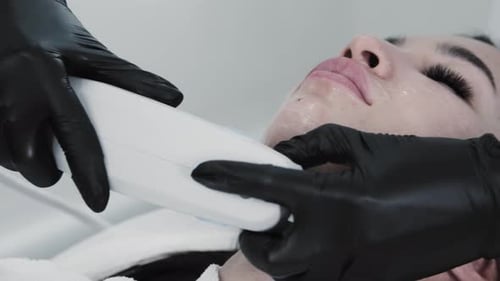 Woman Receiving a Cosmetic Procedure in Clinic