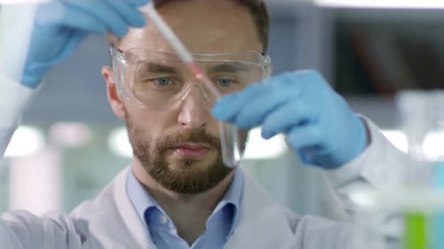 Male Scientist Carrying out Research in Laboratory
