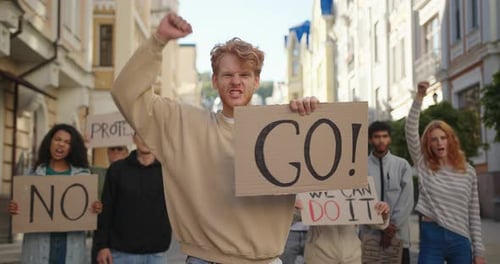 Young Adults Protesting in the City Street