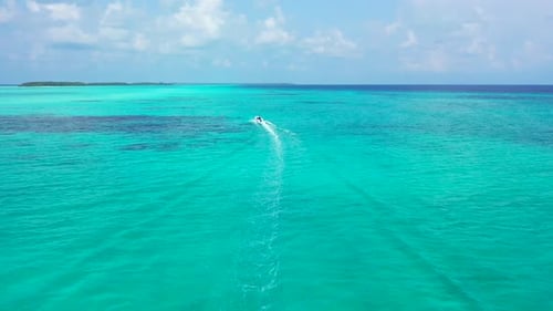 Aerial above texture of beautiful seashore beach break by blue sea with white sand background of jou