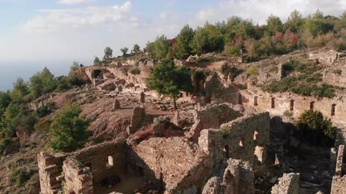 Ruins of ancient city in mountains.