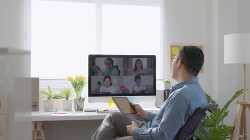 Man on Video Call Working from Home Office