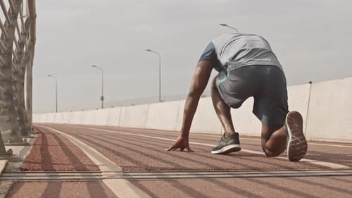 Black Man Sprinting Outdoors