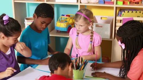 Group of Children Drawing Together in Classroom