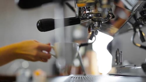 Woman Preparing Espresso with Machine Close Up Shot