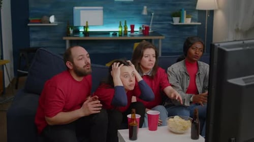 Group of Multiethnic People Frustrated After Football Team Losing Match Competition