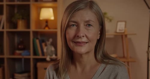 Close Up of Smiling Woman in Home Interior