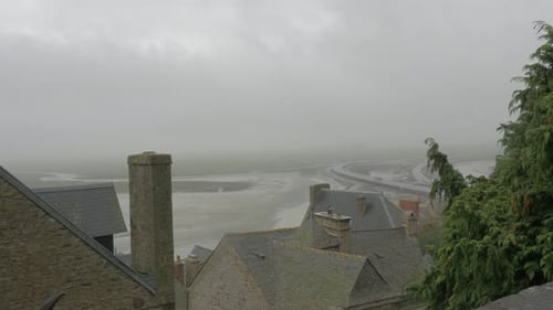 View from Mont St Michel famous tourist attraction in northern France 4k 2160p UHD footage - Mon