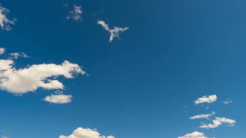 Clouds Drifting in a Blue Sky Time Lapse