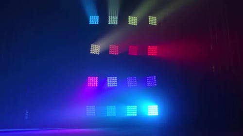 The Stage of a Small Theater with Red and Blue Spotlights. Lights Are Turned on From Darkness.