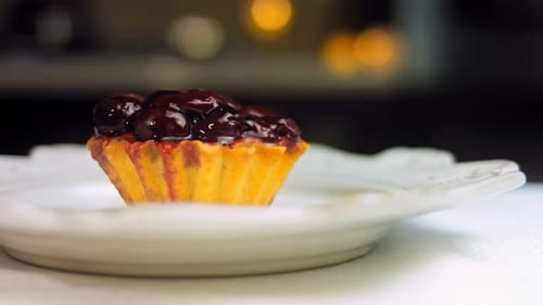 Delicious Cherry Tart on White Plate Close-Up