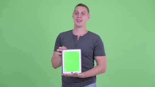 Man Holding Tablet with Green Screen Talking