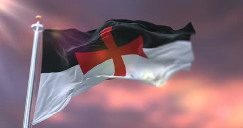 Drapeau des Templiers de guerre au coucher du soleil