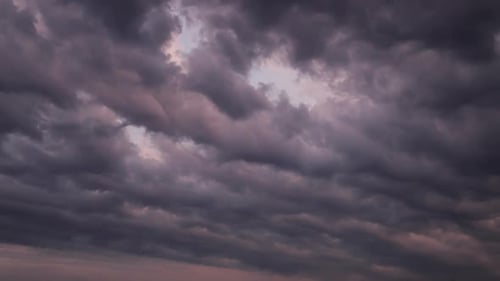 Time lapse amazing fluffy clouds floating the sky going to darkness