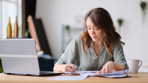 Young Woman Working From Home Office