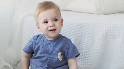 Close-up of a laughing little child. Children's products. Happy loving family