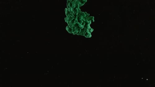 Slow motion shot of green ink on black background, shot with Phantom Flex 4K camera.