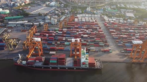 Aerial top view of container cargo ship in the export and import business and logistics
