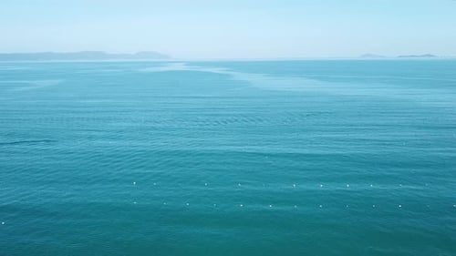 Drone View From Calm Blue Sea.