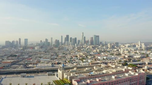 AERIAL: Breathtaking Wide Shot Towards Downtown Los Angeles, California Skyline in Beautiful