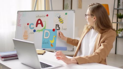 Woman Teaching Online Lesson From Home Office