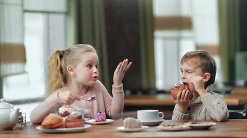 Funny Girl and Boy Kid Communicating Eat Delightful Breakfast at Cafeteria