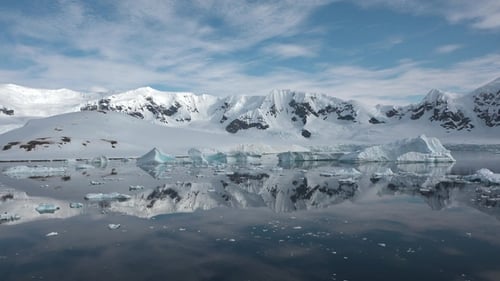 Majestic Icebergs and Snow-Capped Mountains in Antarctica