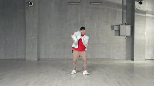 Man Dancing in Empty Urban Studio