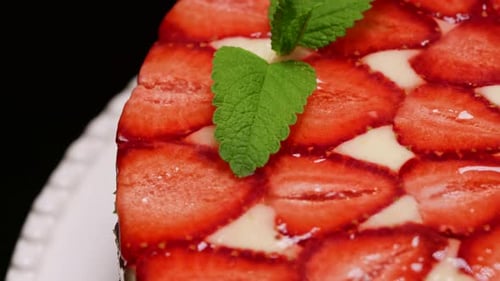 Delicious Strawberry Cake with Mint Garnish