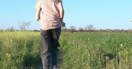 Children Run in the Rural Field