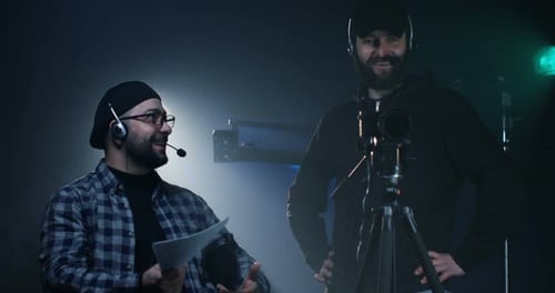 Two Bearded Men Working in Film Studio