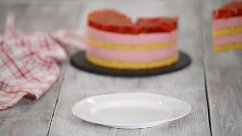 Serving Slice of Delicious Strawberry Layer Cake