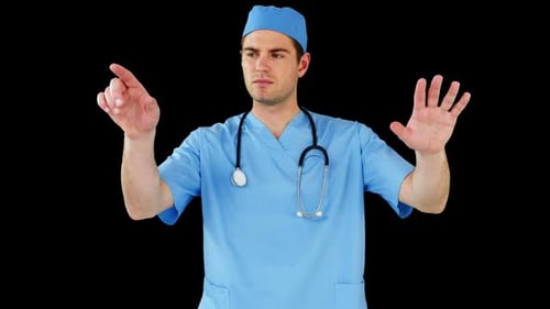 Surgeon pretending to be using futuristic digital screen