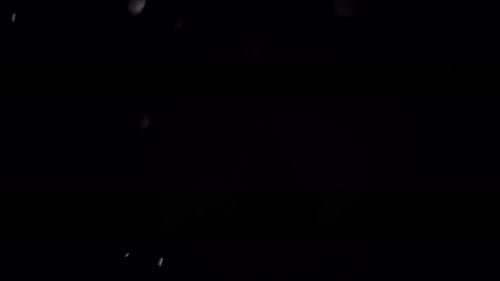 Abstract Black Background with Floating White Particles