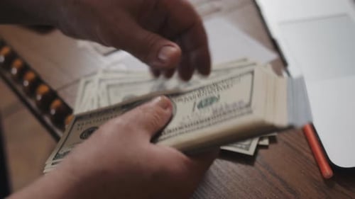 Counting Stack of Hundred Dollar Bills