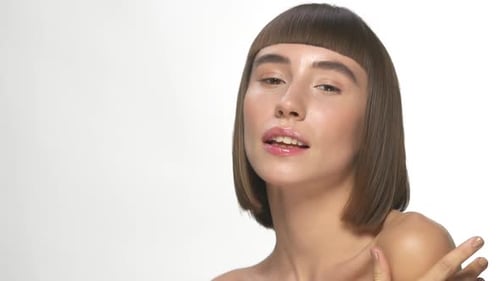 Glamorous Woman Posing with Stylish Bob Haircut