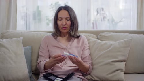 Patient Using Glucose Meter