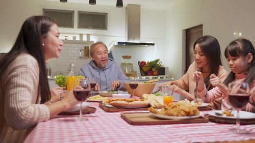 Generations Enjoy Family Dinner Together at Home