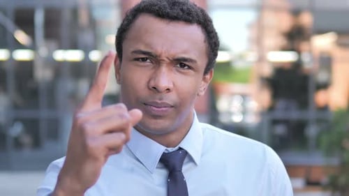Angry African Businessman Yelling Outdoor