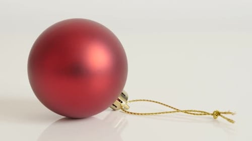 Matte color shiny bauble close-up 4K 2160p 30fps UltraHD tilting footage - Red Christams ornament o
