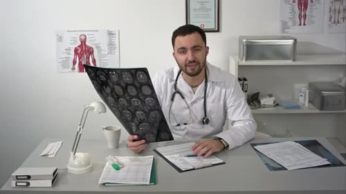 Doctor Explains X-Ray Results in Office