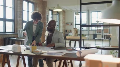 Multiethnic Architects Cooperating in Office