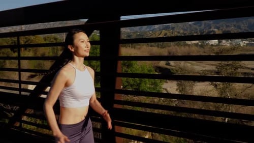 Attractive asian woman going for her morning run