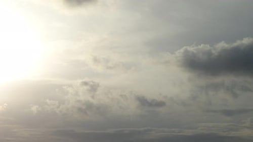 Timelapse of an aircraft followed by dark stormy clouds while night comes.