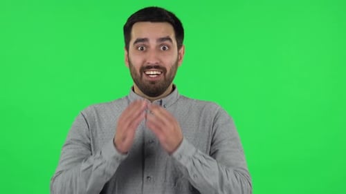 Portrait of Brunette Guy with Shocked Wow Face Expression. Green Screen